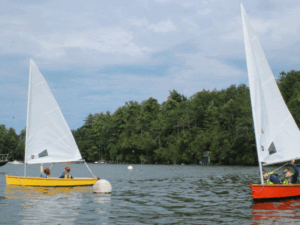 Split Rock Dinghies rounding a mark during a race. 800x600