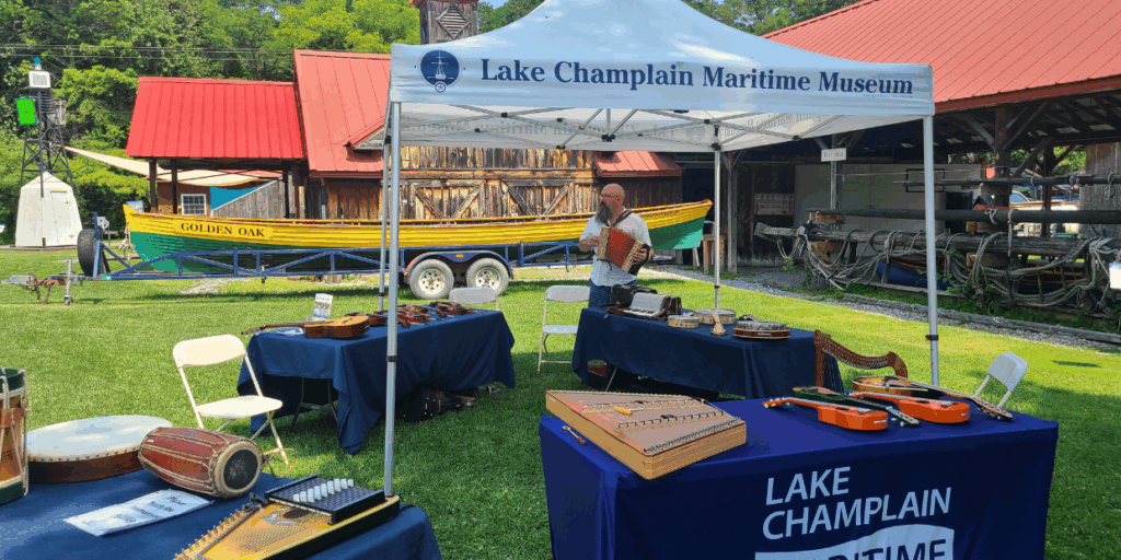 Ian Drury from the Vermont Folklife Center brings the Instrument Petting Zoo (IPZ) to LCMM. Wide