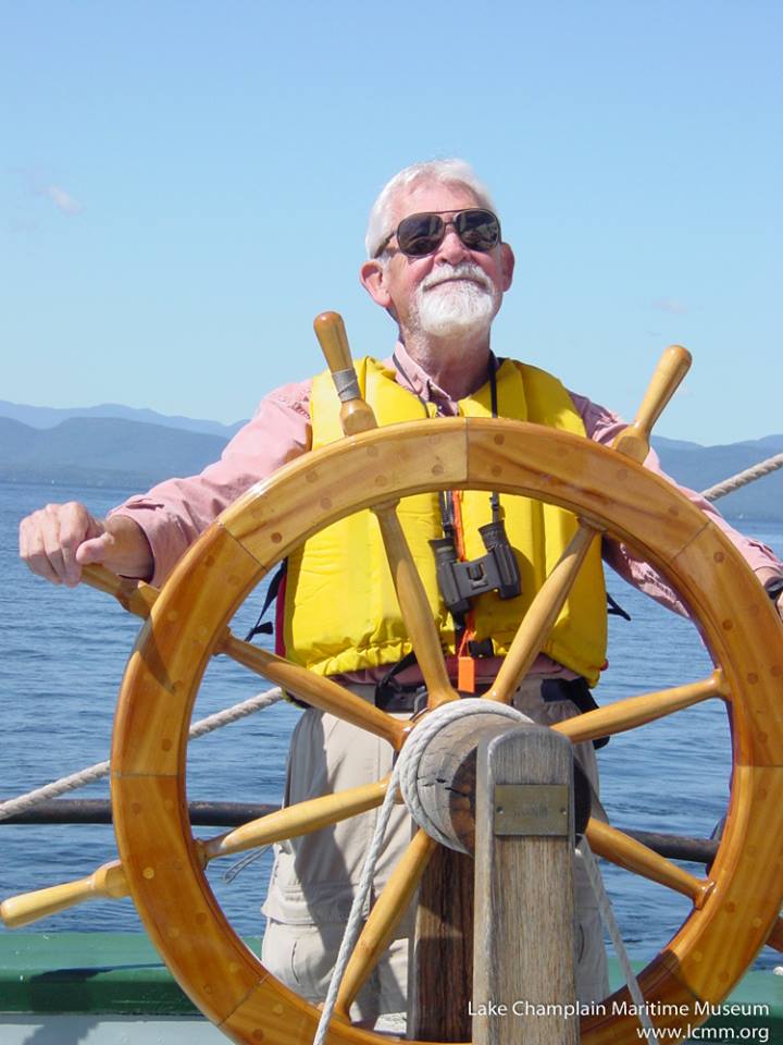 Ernie Haas at the wheel of the Lois McClure at Lake Champlain Maritime Museum
